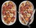 Plateful of Freshly Spit Roasted Pork Thigh Crispy Crackling Meat Slices in Oval Porcelain Trays Isolated on Black Background Royalty Free Stock Photo