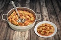 Plateful Of Pickled Cabbage Rolls Stuffed With Minced Meat Cooked In Steel Saucepot Served On Old Cracked Flaky Garden Table