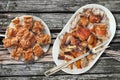 Plateful Of Spit Roasted Pork Shoulder And Serbian Crumpled Cheese And Spinach Pie Slices Set On Old Rustic Picnic Table