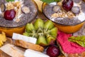 Plater of food with wrap, cheese, fruits and sweets Royalty Free Stock Photo