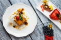 Plates with cake and berries.