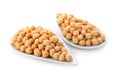 Plates with chickpeas on white background