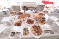 Plates and dishes on the handout table in the restaurant