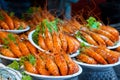 Plates of huge boiled shrimp at the street food market