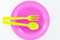 Plates, plastic utensils isolated