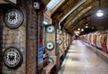 Platform at Baker Street underground train station, showing original brickwork and detail.