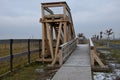 Platform of a lookout tower made of oak logs and planks with barrier-free access for seniors and the immobile. wheelchair ramp. me