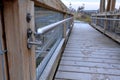 Platform of a lookout tower made of oak logs and planks with barrier-free access for seniors and the immobile. wheelchair ramp. me