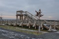 Platform of a lookout tower made of oak logs and planks with barrier-free access for seniors and the immobile. wheelchair ramp. me