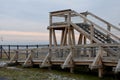 Platform of a lookout tower made of oak logs and planks with barrier-free access for seniors and the immobile. wheelchair ramp. me