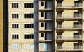 platform for taking heavy load with a crane in the construction multi-storey building apartment. Royalty Free Stock Photo