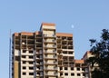 platform for taking heavy load with a crane in the construction multi-storey building apartment. Royalty Free Stock Photo