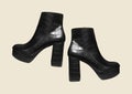 Platform women`s snakeskin boots Royalty Free Stock Photo