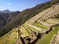 The platforms cultivation terraces of Machu Picchu look like great steps built on the hillside. Royalty Free Stock Photo