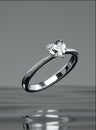 The platinum diamond ring float on the surface of the water. Heart diamond ring design with 3D render Royalty Free Stock Photo