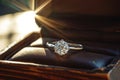 A platinum diamond ring is in a jewelry box, the concept of luxury