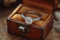 A platinum diamond ring is in a jewelry box, the concept of luxury