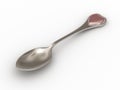 Platinum spoon with heart emblem on handle