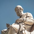 Plato, the ancient Greek philosopher white marble statue on sky background