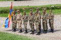 Platoon of soldiers of the Armenian armed forces, with the flag of the Armenian republic