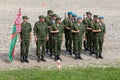 Platoon of soldiers of the Belarusian army with the flag of the Belarusian republic