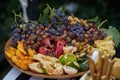 Platter of assorted fresh fruit, close-up, outdoor Royalty Free Stock Photo
