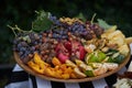 Platter of assorted fresh fruit, close-up, outdoor Royalty Free Stock Photo