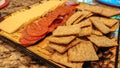 Platter of cheese, pepperoni and wheat crackers Royalty Free Stock Photo