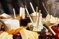 Platter of cheeses, fruit, jams Royalty Free Stock Photo