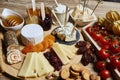 Platter of cheeses, fruit, jams Royalty Free Stock Photo