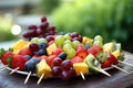 Platter of colorful fruit kabobs with a variety of fresh fruits Royalty Free Stock Photo