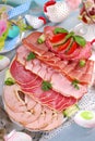 Platter of cured meat,ham and salami on eater table Royalty Free Stock Photo