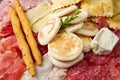 Platter of cured meats, cheeses and fried dumpling Royalty Free Stock Photo