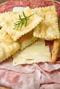 Platter of cured meats, cheeses and fried dumpling Royalty Free Stock Photo