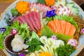 Platter decorated with different flavors of elegant sushi