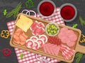 Platter of different cold meats on the table background