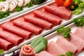 Platter of fresh meat cold cuts on table Royalty Free Stock Photo