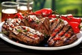 platter of grilled tuna steaks with chili pepper garnish