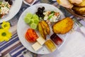 Turkish halal breakfast with baked potato, cheese, toast, egg, vegetables, olives, sauces Royalty Free Stock Photo