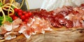 Platter of Italian cold cuts, coppa, salami and raw ham Royalty Free Stock Photo