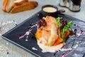 Platter: salmon steak with grilled vegetables and tender bread Royalty Free Stock Photo