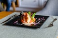 Platter: salmon steak with grilled vegetables and tender bread Royalty Free Stock Photo