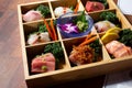 platter of sashimi pieces, sushi, box, platter, sampler Royalty Free Stock Photo