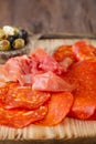 Platter of serrano jamon Cured Meat, chorizo and olives