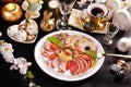 A platter of sliced ham and cured meat for Easter top view Royalty Free Stock Photo