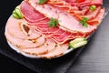 Platter of sliced ham,salami and cured meat Royalty Free Stock Photo