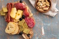 Platter with Spanish ham jamon or Italian prosciutto crudo, sliced Italian hard cheese. homemade dried meat salami, on Royalty Free Stock Photo