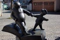 Plauen, Germany - March 16, 2023: Sculpture of Father and Son by Erik Seidel in front of Vogtland Museum in the Old Town of Plauen