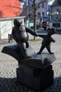 Plauen, Germany - March 16, 2023: Sculpture of Father and Son by Erik Seidel in front of Vogtland Museum in the Old Town of Plauen