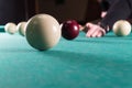 Play billiards. cue and billiard balls. hammer the ball into the hole Royalty Free Stock Photo